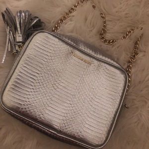 Woman’s silver crossbody bag